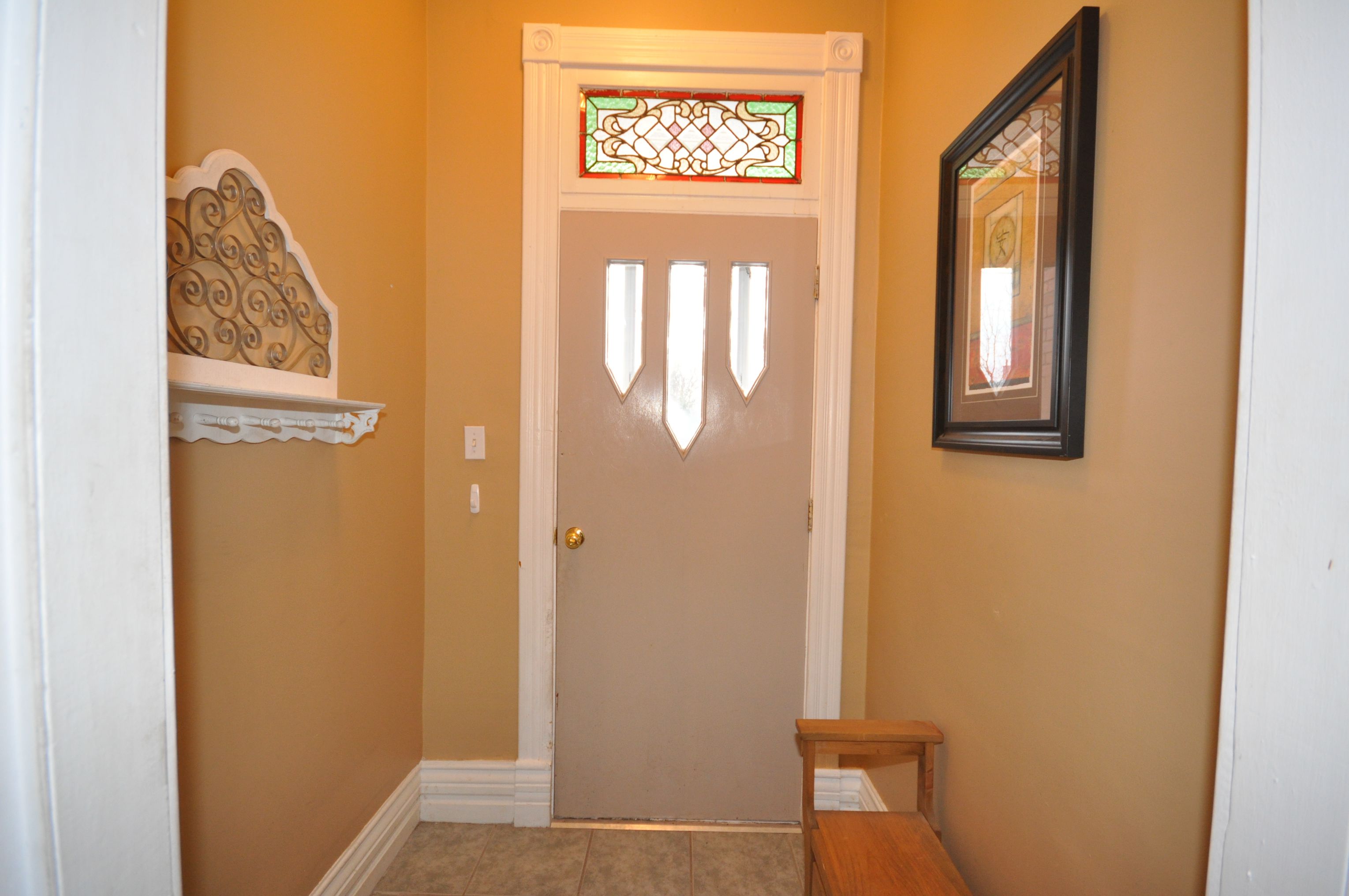 Ceramic foyer & stained glass window