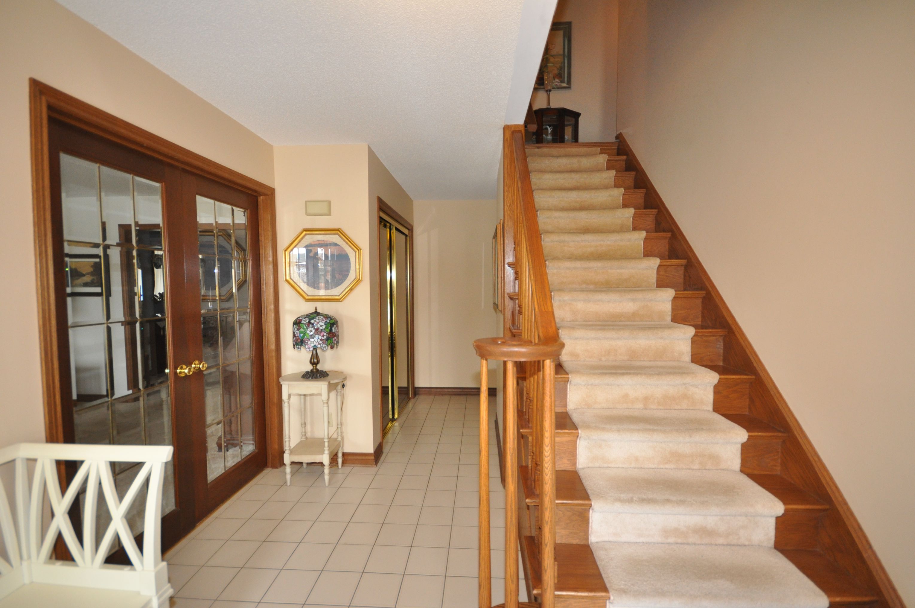 Oak staircase leading upstairs
