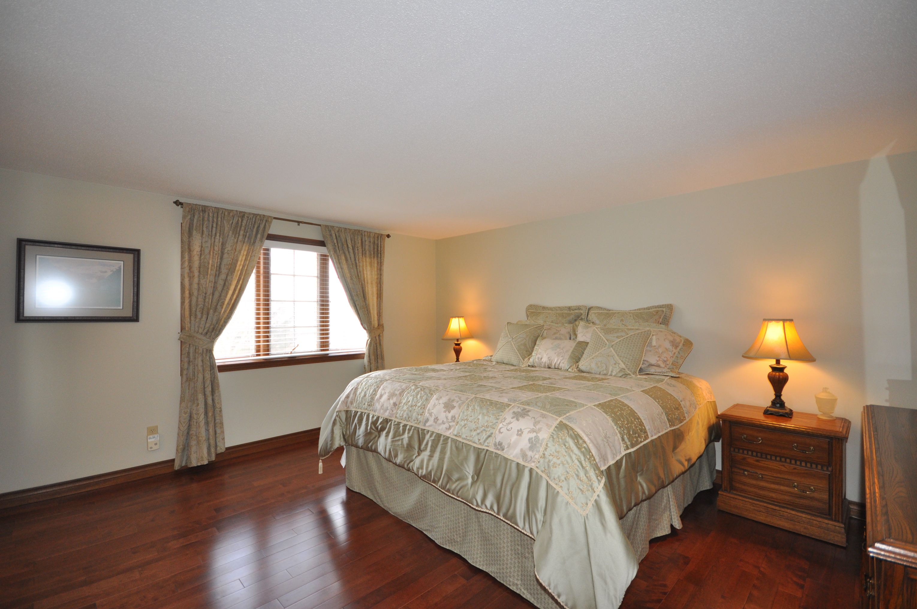 Master Bedroom with large sunny window and walk in closet