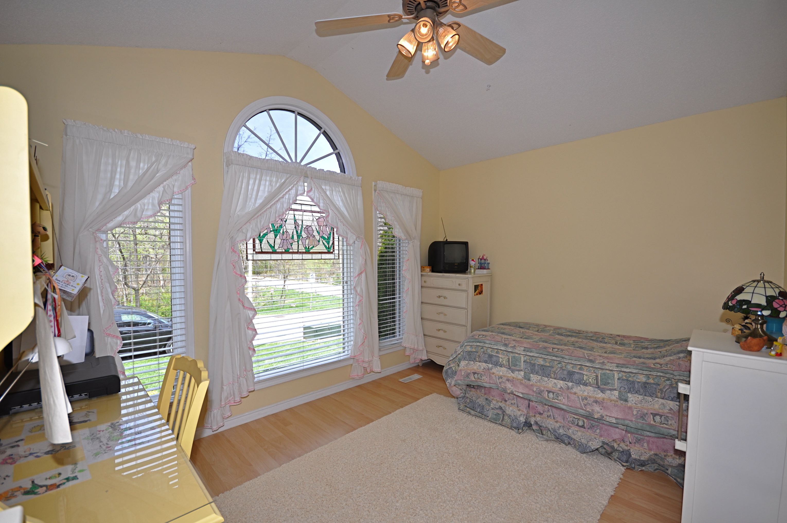 Sunny 2nd bedroom with newer flooring