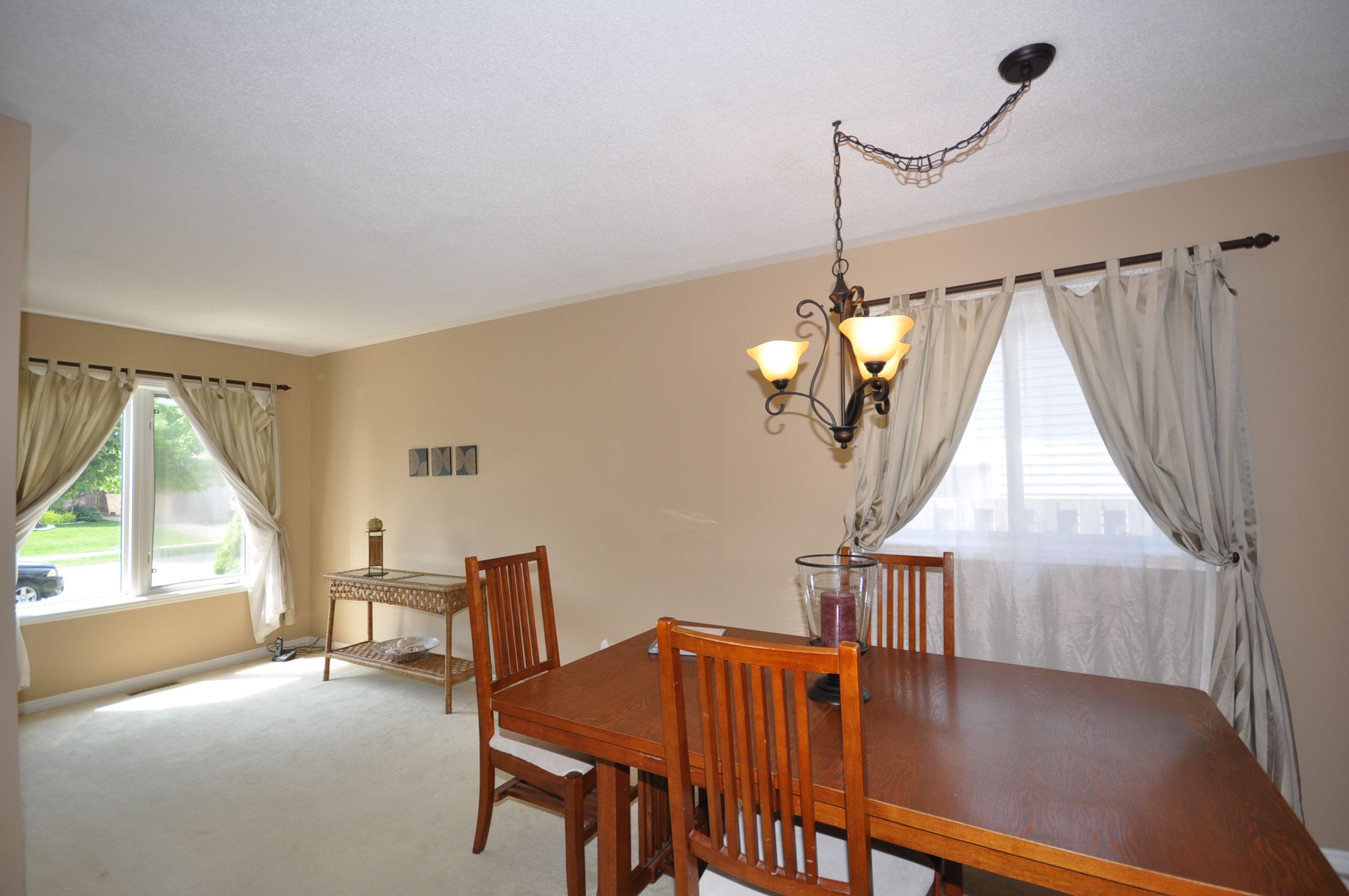 Lots of large sunny windows in the living / dining room