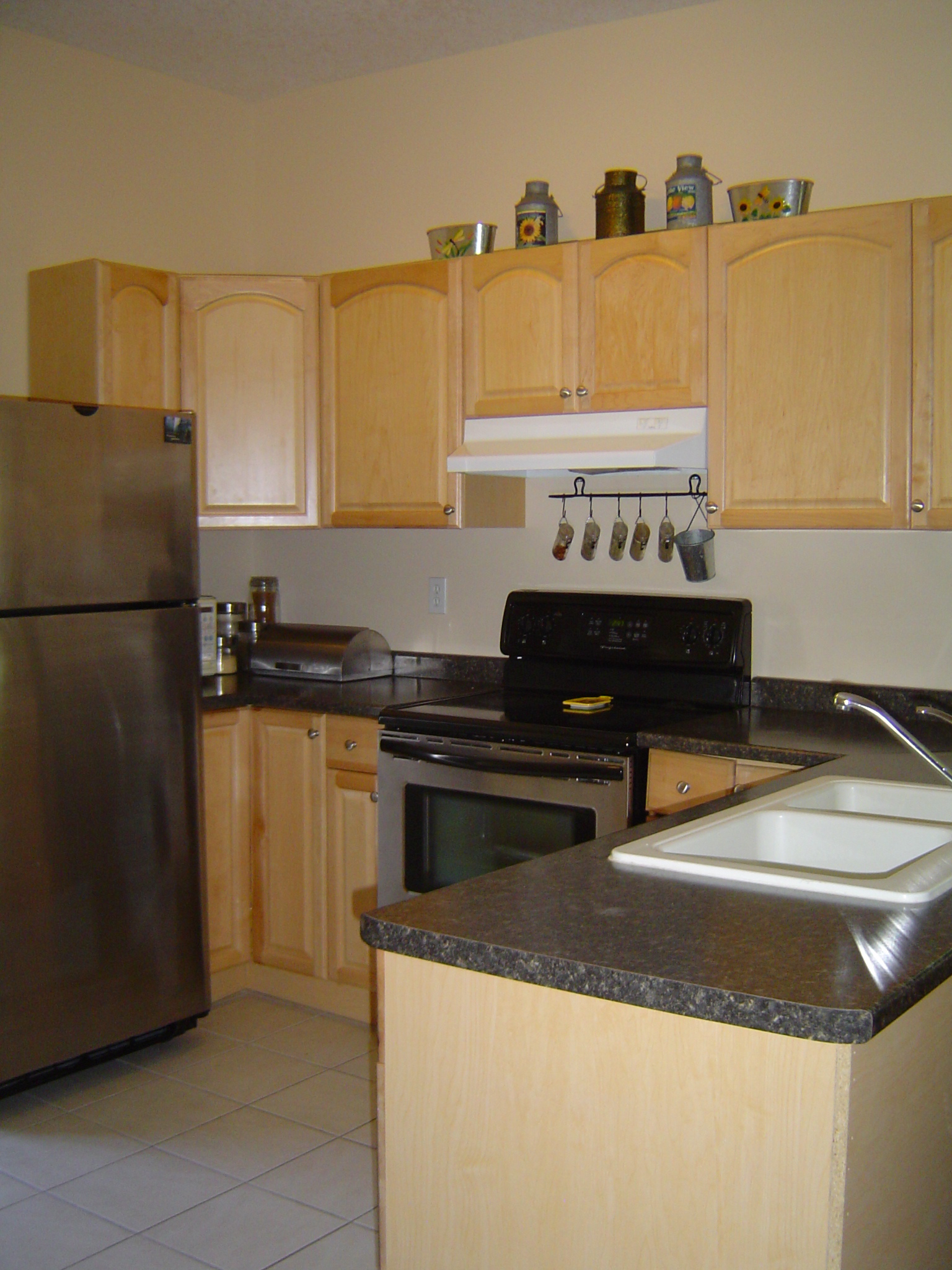 Newer kitchen located at the back of the house