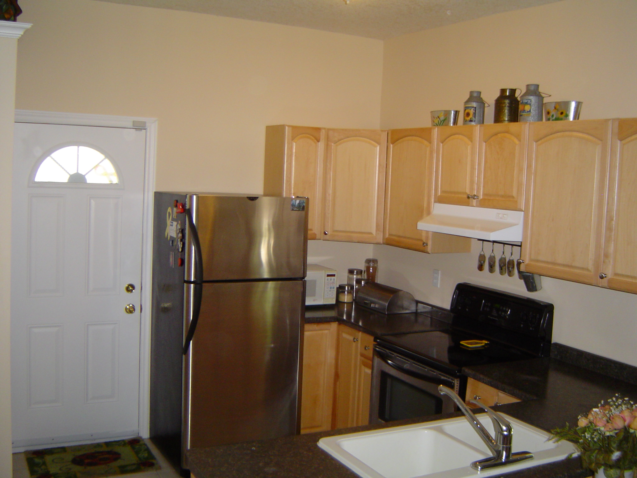 Door off the kitchen leads to sundeck and a nice sized backyard