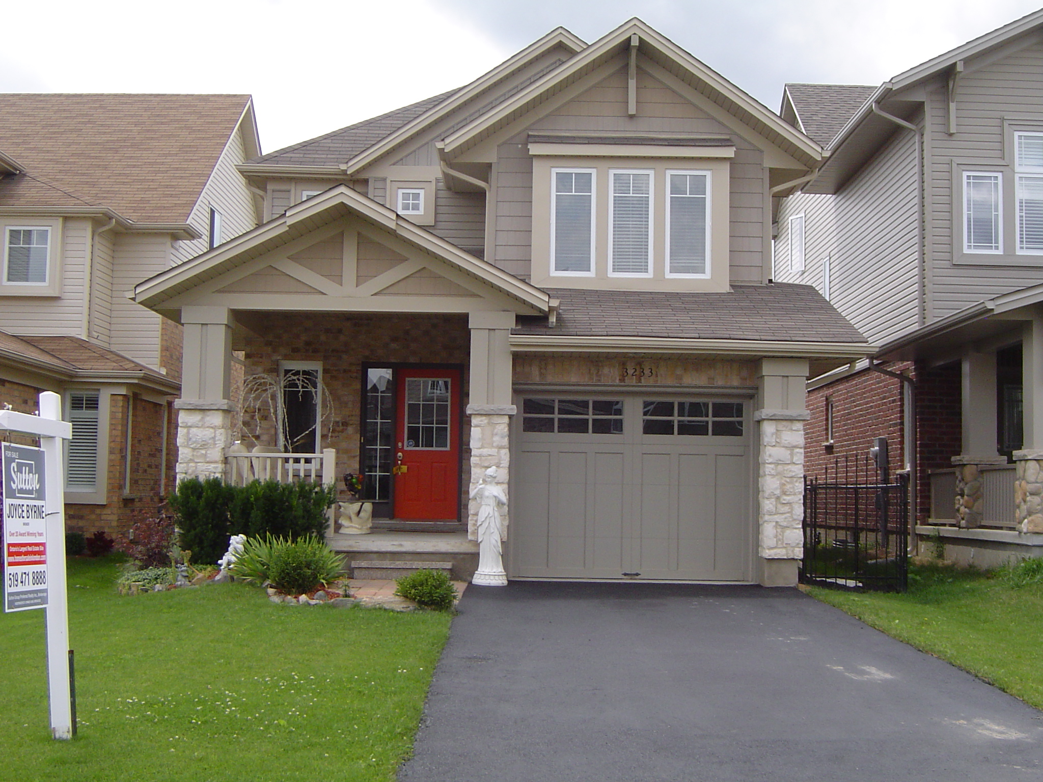 3233 Bayham Lane - Craftsman style with cobblestone pillars