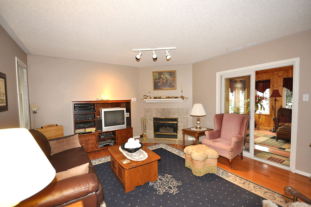 Living Room has patio doors to Family Room