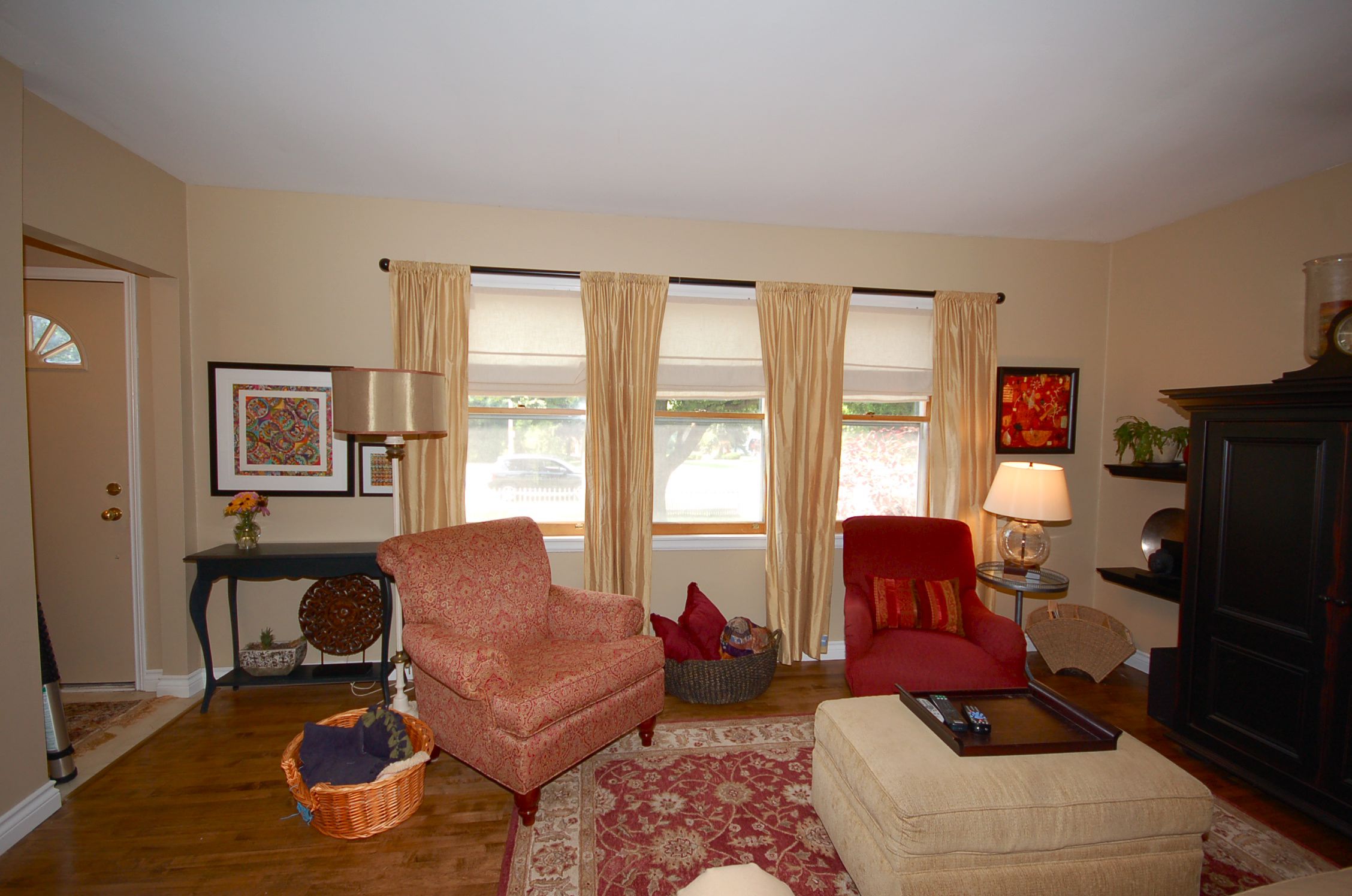 Bright sunny window in the spacious living room