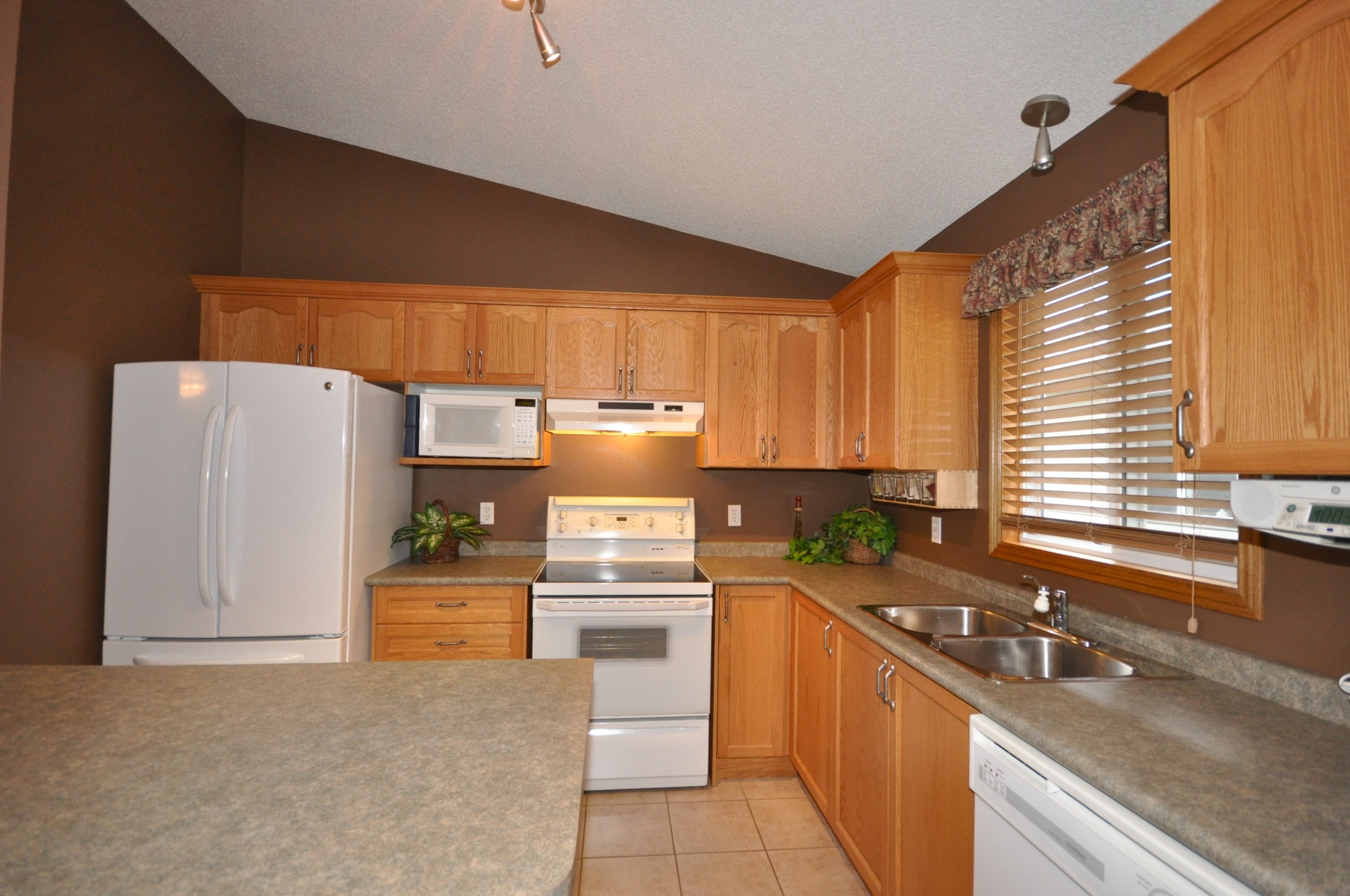 Large cupboard laden Kitchen