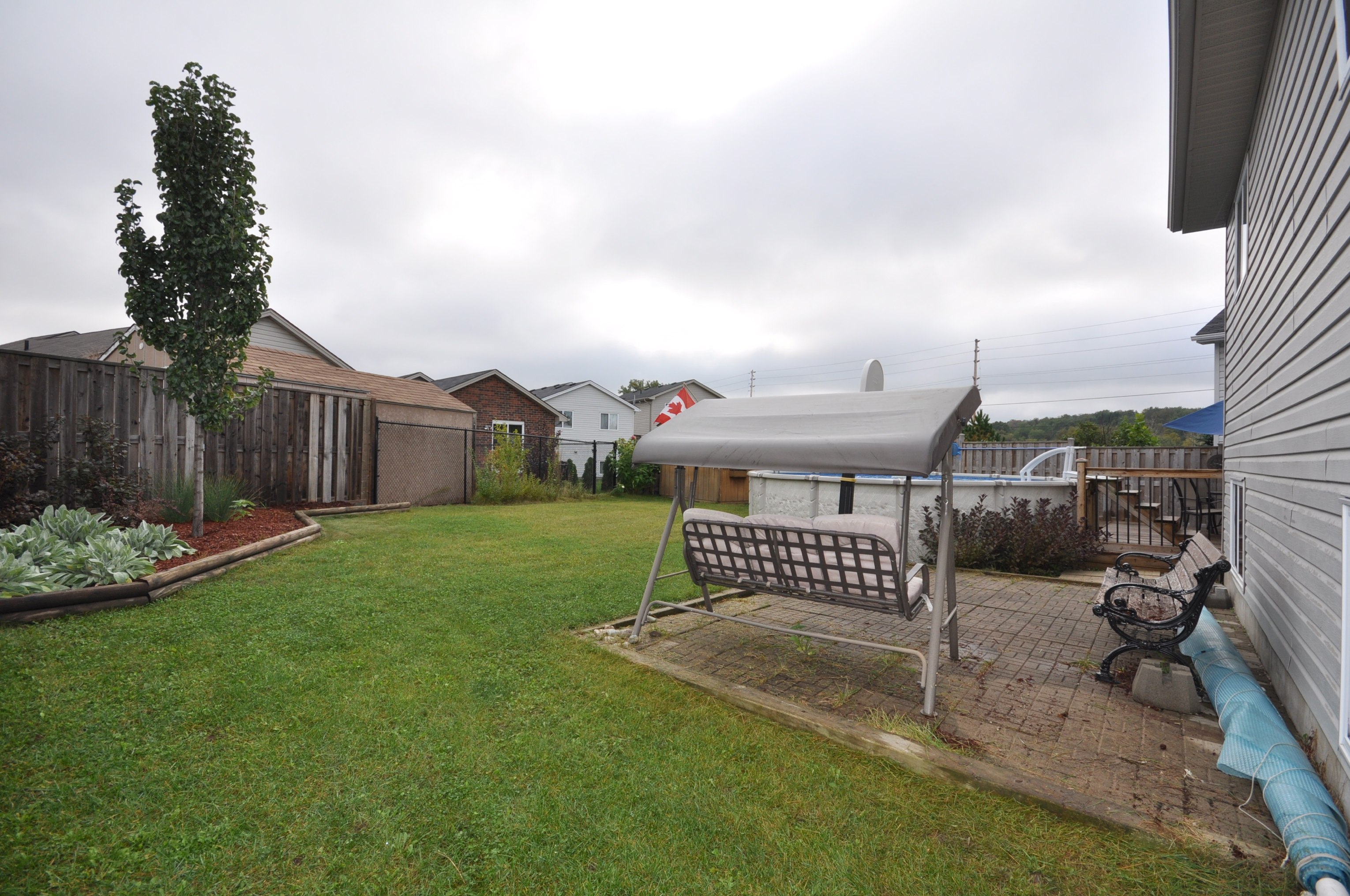 Private fenced backyard