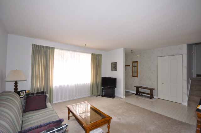 Spacious Living Room with Bay Window