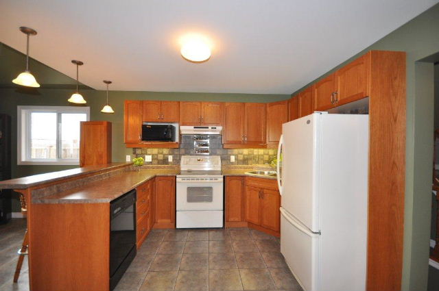 Kitchen with an abundance of counter and cupboard space 