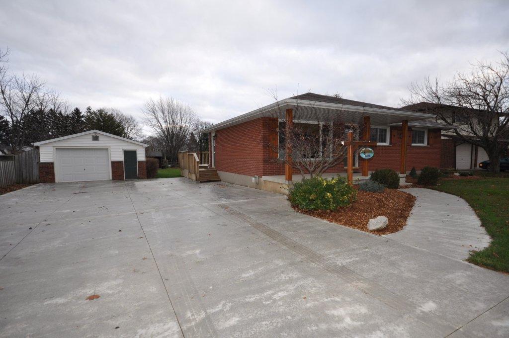 Recent addition of a huge concrete driveway & front walkway