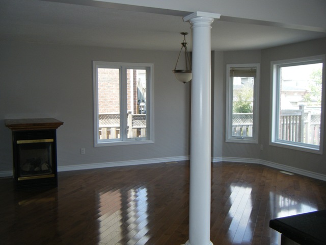 Pillared Open Concept Living Room/Dining Room