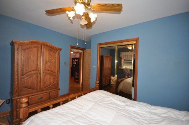 Convenient Mirrored Closet Doors in Master Bedroom