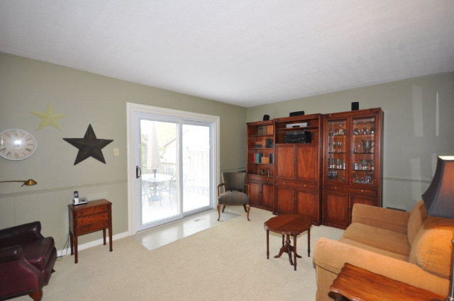 Bright Family Room with doors to deck