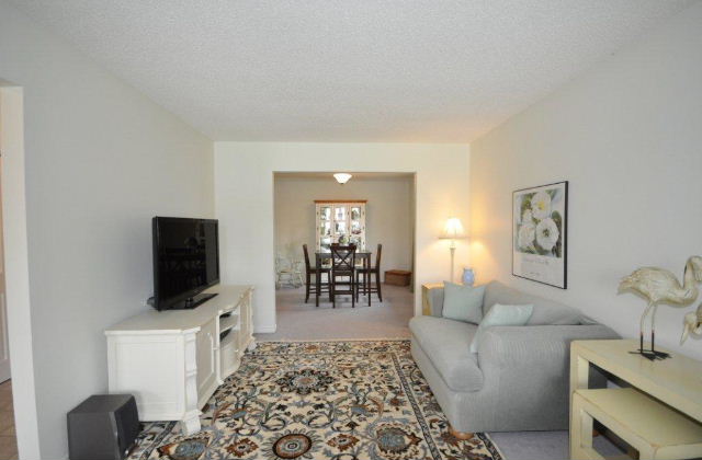 Living room looking into formal dining room 