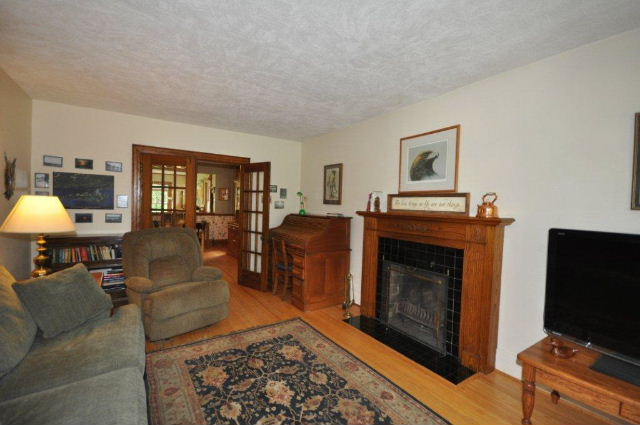 Living room with oak fireplace