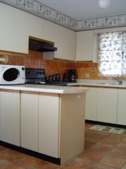 The cook of the family will appreciate all the counter and cupboard space plus the double pantry.