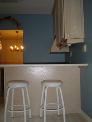 Washed oak cupboards in the kitchen with finish breakfast island,corner shelves, roller drawers and more