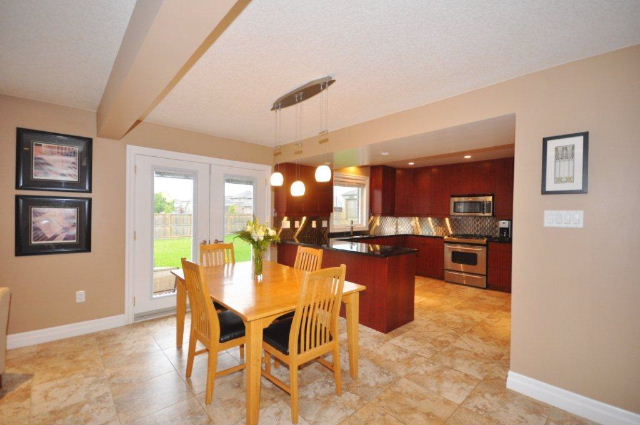 Kitchen with doors to Patio