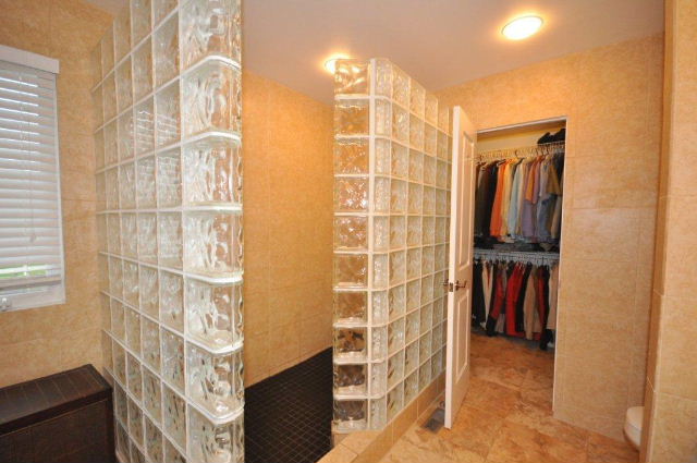 Glass block shower and walk-in closet