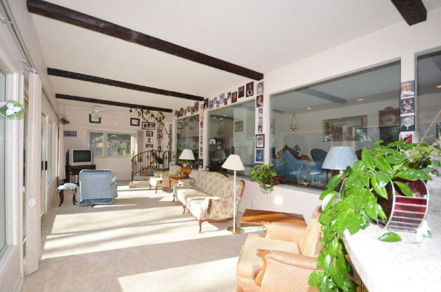 Amazing Sunroom across Rear of Home