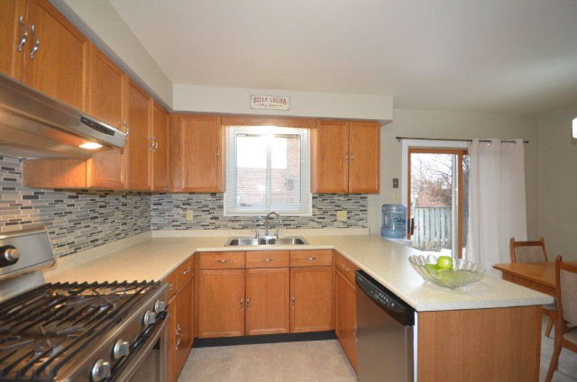 New Flooring, Cabinetry Hardware, Sink,Tap and Fabulous New Backsplash too!