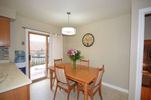 Eat-in Kitchen showing door to private patio