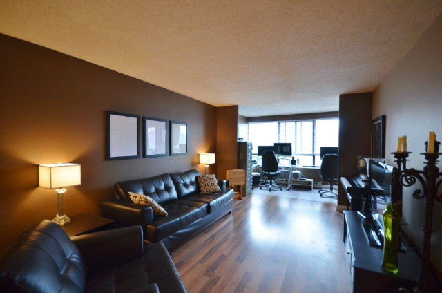 Living Room with view of Sunroom