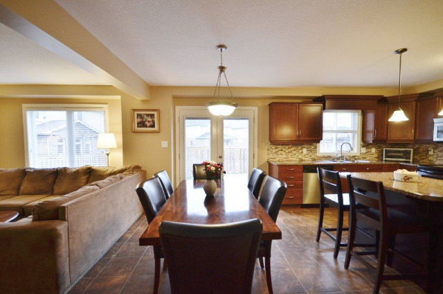 View of Dinette showing doors to patio and saltwater pool