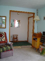 Spacious front foyer off living room 