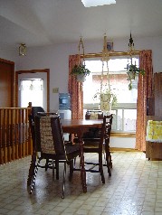 Seperate eating area and also a main floor laundry in the large closet/pantry area off the eating area. 