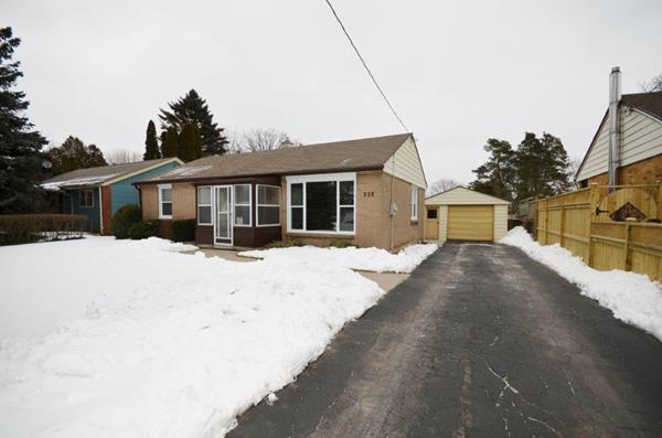 Long Private Drive with Detached Garage