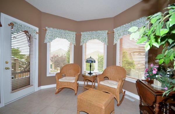 Sunroom sitting area with door to Deck