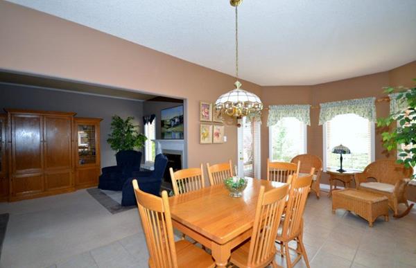 Eating Area with view of Sunroom Style Sitting Area