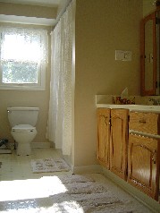Upstairs you will also find a newer family sized bath with relaxing Jacuzzi and his and her sinks 