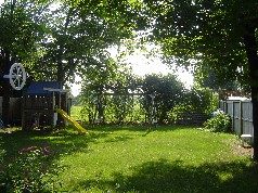 The rear yard is totally fenced and very private & backs onto a school yard 