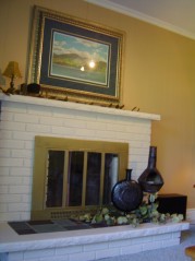 Family room enjoys a toasty wood burning fireplace and warm berber carpeting 