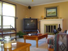 The main floor family room boasts a large window overlooking the backyard so you can enjoy the view 