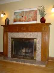 Living Room with a 2nd wood burning fireplace & french doors to seperate it from the rest of the home. 