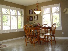 Eating area has doors leading to the sundeck 