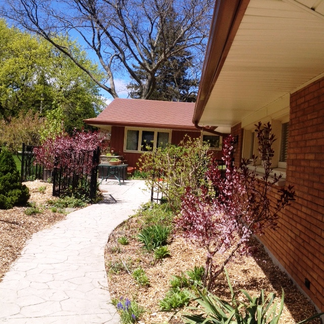 Winding walkway to Front Door