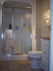 3 piece ensuite has ceramic flooring & sunny window 