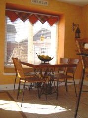 Seperate eating area with attractive window seat 