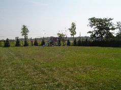 Totally fenced in newer black metal fencing 