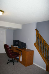 Lower level recreation room with space for your office