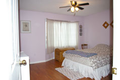 Master bedroom with new laminate flooring