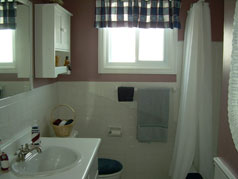 Spacious updated bathroom with large window