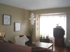 Large living room with new sunny bay window