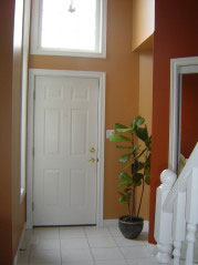  Foyer with upgraded mirrored closet door and 2nd storey windows 