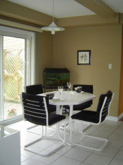  Eating area has oversized terrace doors to spacious interlocking back patio